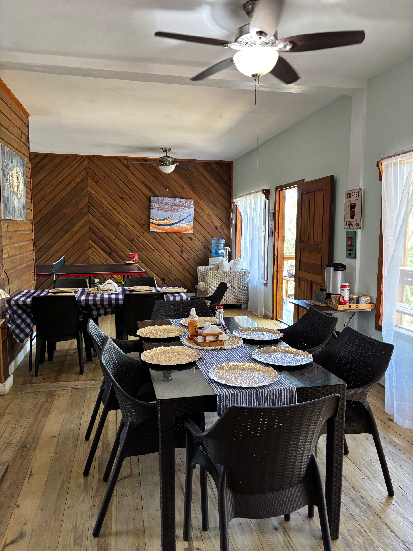 Communal dining room — long tables for shared breakfasts and family-style dinners.