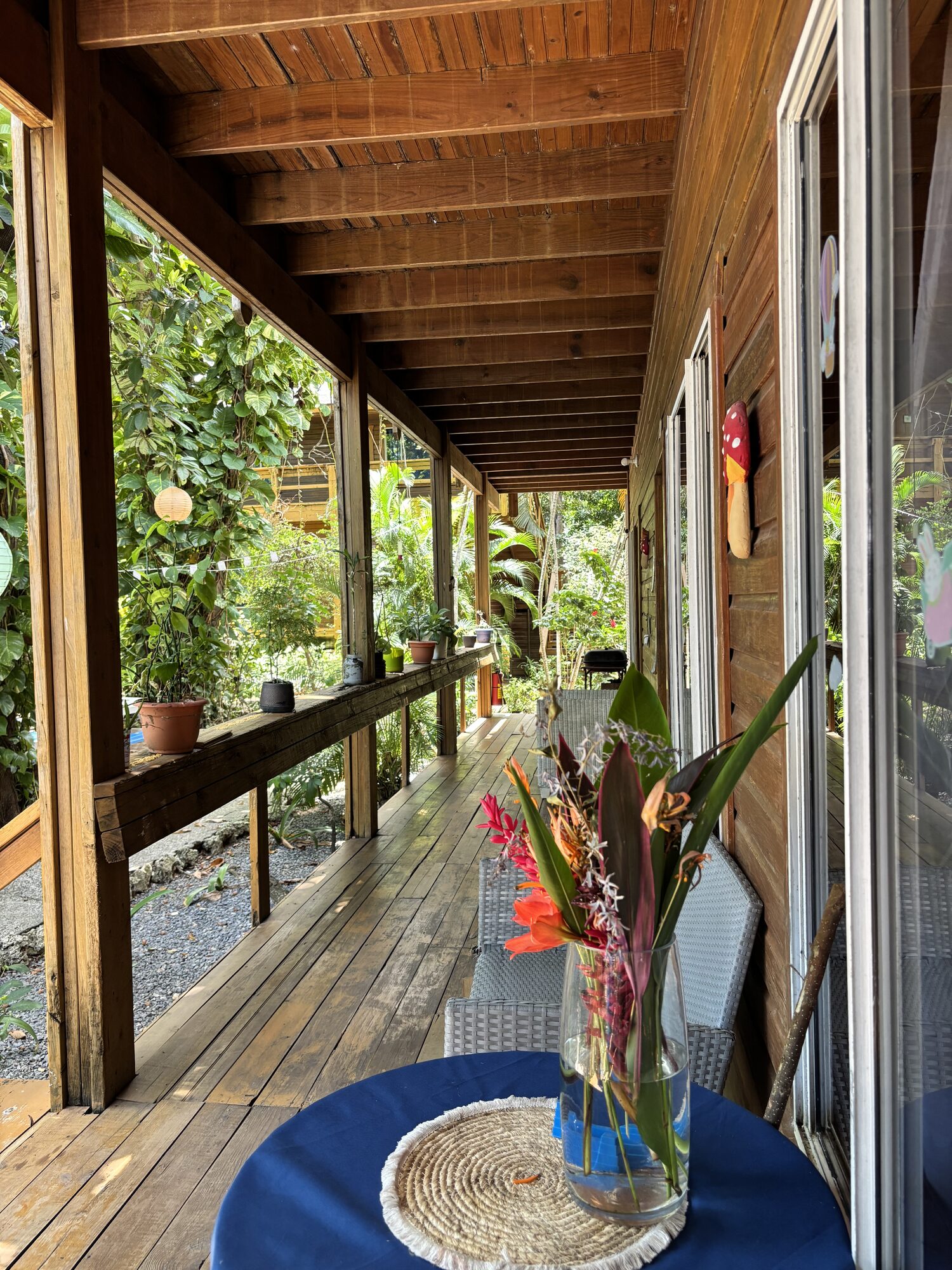 Wooden veranda with tropical flowers