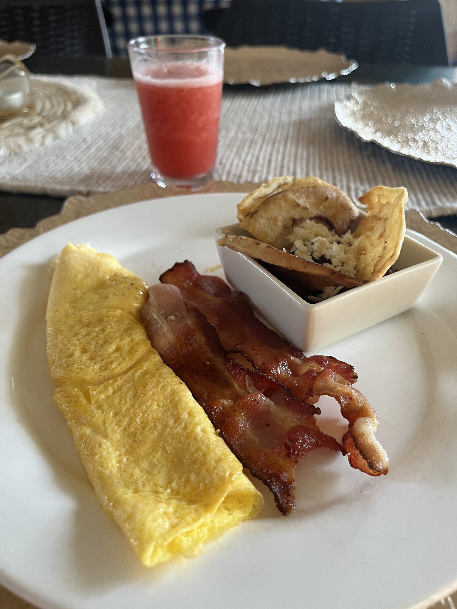 Breakfast with bacon and fresh juice